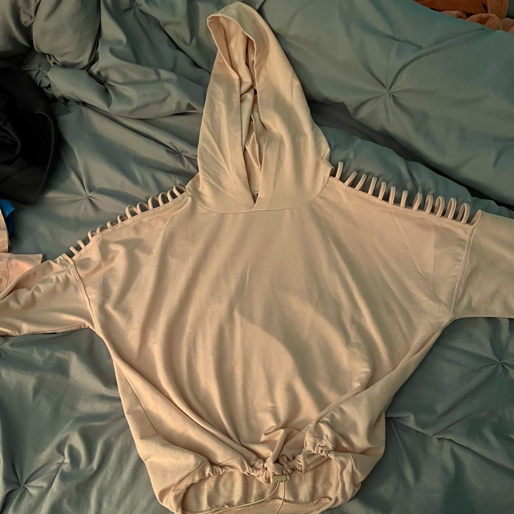 Light pink forever 21 sweatshirt. It is a size medium.